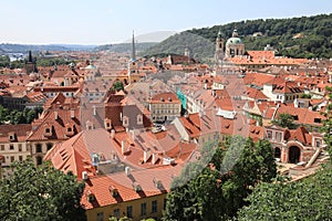 Classic Prague - aerial view to old roof buildings and street ,  Czech Republic