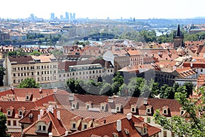 Classic Prague - aerial view to old roof buildings and street ,  Czech Republic