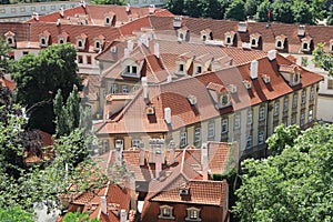 Classic Prague - aerial view to old roof buildings and street ,  Czech Republic