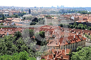 Classic Prague - aerial view to old roof buildings and street ,  Czech Republic