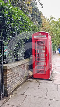 Classic red British telephone booth in London