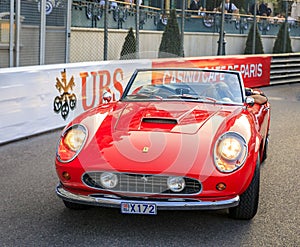 Classic red Ferrari California Spider in front of Monte Carlo Casino, Monaco