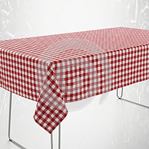 Classic red and white gingham patterned tablecloth draped over a table