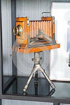 classic retro camera on tripod