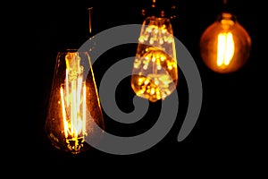 Classic retro incandescent led electric lamp on black background