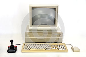 Classic Retro PC from the Eighties with Monitor, Mouse and Joystick. Used for Gaming, Writing and Graphics on White