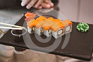 Classic roll philadelphia on black slate plate