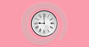 Classic round wall clock with roman numerals isolated on pink background