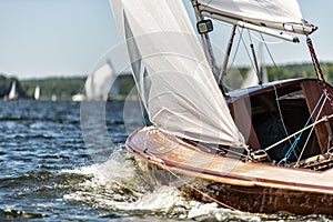 Classic sailing yacht on a lake in a regatta