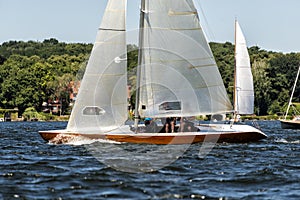 Classic sailing yacht on a lake in a regatta