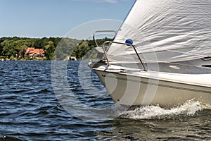 Classic sailing yacht on a lake in a regatta