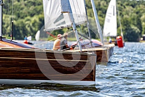 Classic sailing yacht on a lake in a regatta