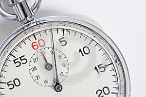 Classic 60 second stopwatch on white background photo