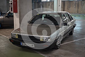 Classic silver gray Volkswagen Santana GX5, parked in a parking lot