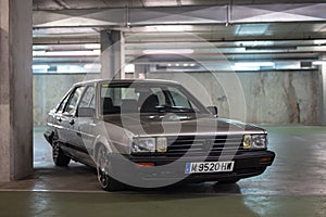 classic silver gray Volkswagen Santana GX5, it is parked in a parking lot