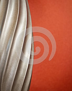 Classic Silver Spiral with Rust Backdrop