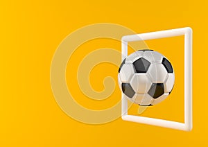 Classic soccer ball in the goal on bright yellow background