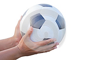 Classic soccer ball in male hands.