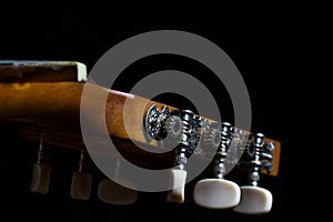 Classic spanish guitar on black background