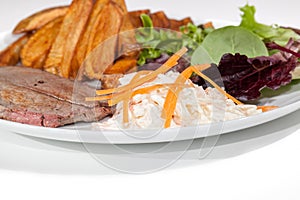 Classic steak and chips meal with home-made coleslaw and salad