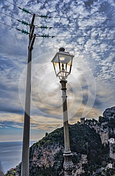 Classic streetlight with modern electric pylon