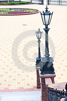 Classic style city lamppost at sunset, close up