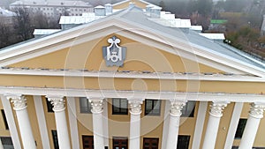 Classic style musical theater building with columns in city