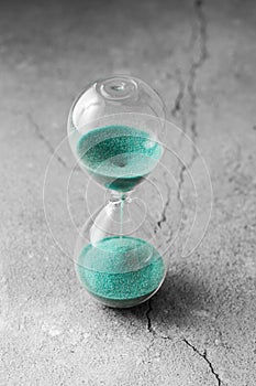 Classic Style Vintage Old Hourglass Sandglass Clock. A sandglass, modern hourglass or egg timer showing the last second or last