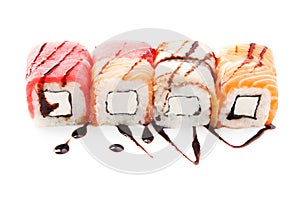 Classic sushi set with diferent type of fish (salmon, tuna, eel) isolated on white background photo