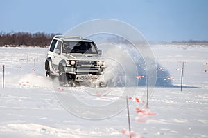Classic SUV riding in the snow