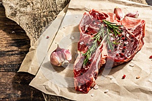 Classic T-bone steak isolated on white background. Hard light, dark shadow, mockup, template