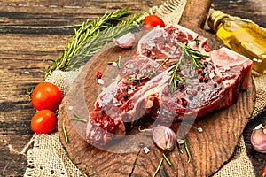 Classic T-bone steak isolated on white background. Hard light, dark shadow, mockup, template