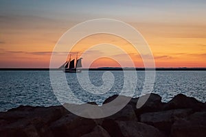 Classic tall ship at sunset