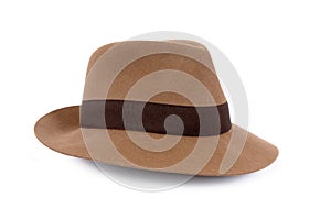 Old classic tan felt Fedora hat isolated on white background