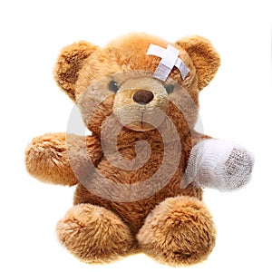 Classic teddy bear with bandages photo