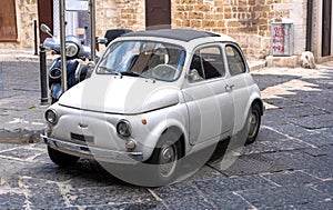 Classic, tiny, italian white car