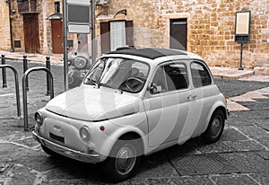 Classic, tiny, italian white car