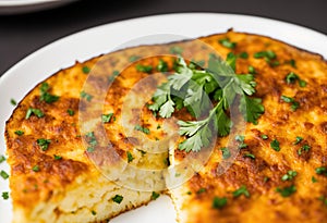 A classic tortilla de patatas, potato omelette sandwich on a slice of bread.