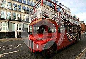 The Classic Tour bus is a red vintage double decker bus tour and sightseeing