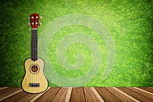 Classic Ukulele on green backdrop