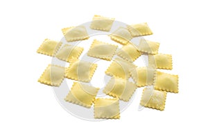 Classic uncooked ravioli pasta isolated on a white background