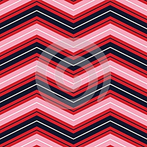 Classic vector seamless pattern with pink, white navy blue chevrons on a red background