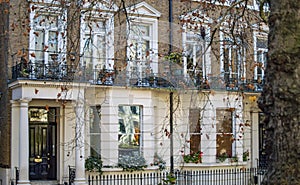 A classic victorian home in london with white paint