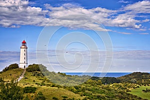 Classic view of the famous lighthouse Dornbusch on the beautiful island Hiddensee with a view of the Baltic Sea, Mecklenburg-