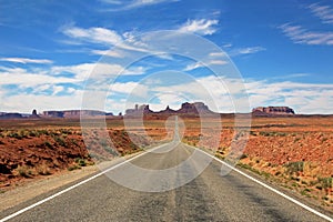 Classic view of road running through Monument Valley, Utah, USA