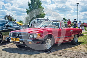 Classic vintage red Mercedes Benz convertible  parked