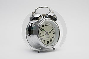 Classic vintage style metal alarm clock to wake from sleep