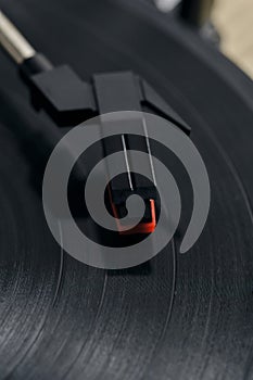 Classic vinyl record player closeup.