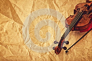 Classic violin on grunge paper background