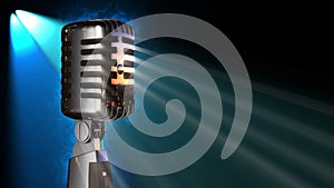 Classic vocal microphone rotating in stage lights